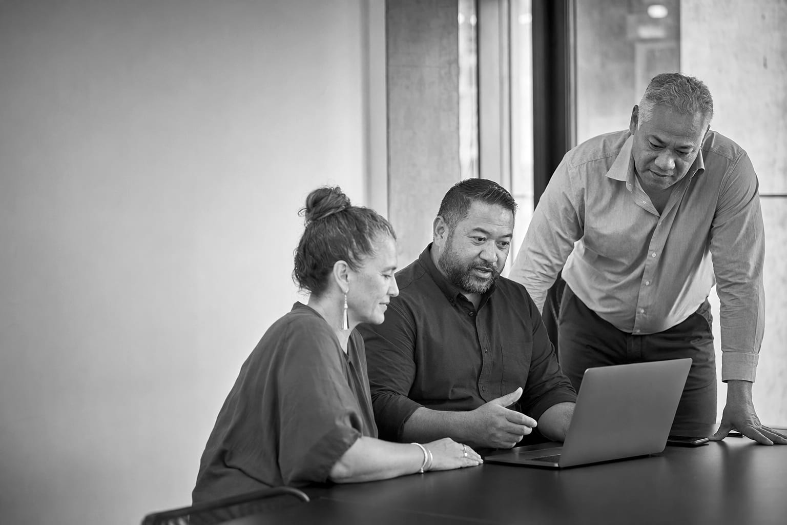 A group of experienced professionals in a working session