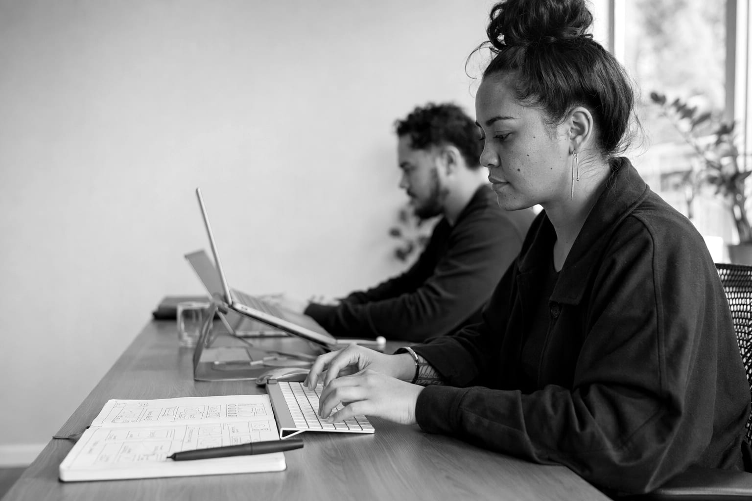 Editorial photograph illustrating "How AI-first development moves from prompts to production"